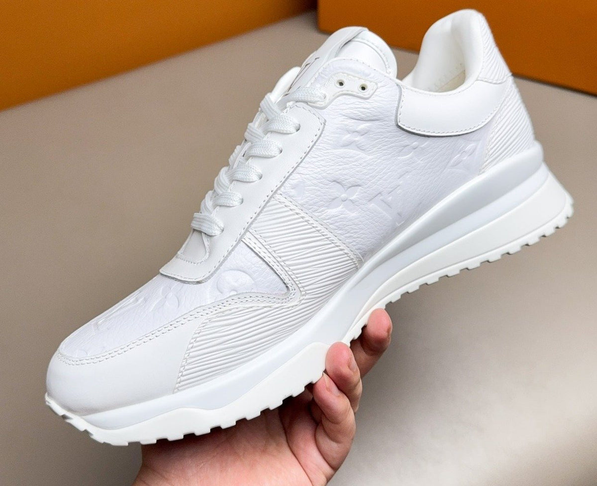 Louis Vuitton Embossed Low-Top Sneakers - Rubber Outsole